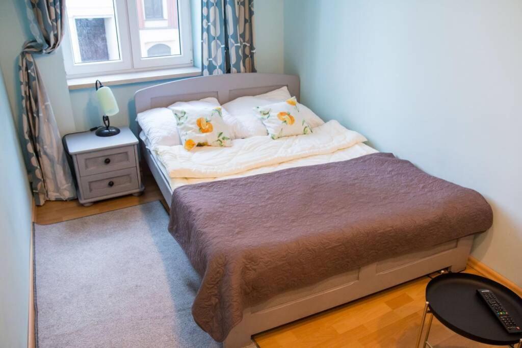 Apartamenty Pod Zegarem *